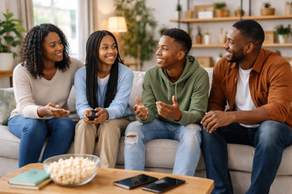 A parent and teenager having a calm conversation at home, symbolizing healthy parenting teens through communication, independence, and mutual respect in 2026.